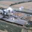 Aerial view of Norbord Factory, Morayston, E of Inverness, looking E.