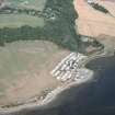 Aerial view of Coulmore Bay Caravan Park and possible cropmarks, near North Kessock, Black Isle, looking NE.