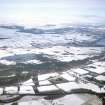 Aerial view of Loch Ussie and Strathconon under light snow, W of Contin, Easter Ross, looking NNE.