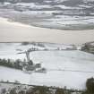 Aerial view of Tarradale Mains under snow, Beauly Firth, looking S.
