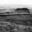 Braidwood: excavation photograph (1948).
Hut 2, looking south. 
Right to left in foreground, postholes 7, 6A, 6, 5. Background, 2, 3.