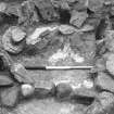 Excavation photographs: Stones in box 1 from E; stones from W; stones from SW; palis slot in SW corner of box 1; palis slot and secondary slabs in box 1; close up of palis slot section; stones in box 1 showing N section; general views from site across Loch Gruinart.