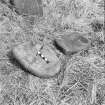 Excavation photograph : rubbing stones?