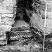 Falkland Palace Excavations
Frame 25 - Trench 2: blocked fireplace after removal of concrete - from east
