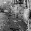 Falkland Palace Excavations
Frame 14 - View along drain F413 with central slab removed - from west