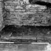 Falkland Palace Excavations
Frame 24 - Flagstones in recess of seventh window from south end of east range after removal of concrete from first floor level - from east
