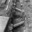 Falkland Palace Excavations
Frame 28 - Service pipes F408 and F412 cutting across channel F407 - from west
