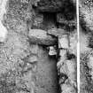 Falkland Palace Excavations
Frame 30 - Extension of excavation showing west end of channel F407 showing discharge pipe at base - from east