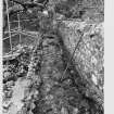 Loch Leven Castle.  Walkway Excavations