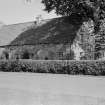 General view of house on Main Street, Tyninghame village, from west.