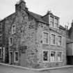 General view of 48-50 East Street, St Monance, from south west, showing A A Purves Fish Restaurant.