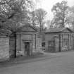 View of entrance gates and buildings, Arbuthnott House.