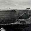 Image from photo album titled 'Braehead Oil Conversion', Oil Storage Tanks from Coal Store