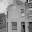 View of street front of 23 East Shore and 1 Water Wynd, Pittenweem