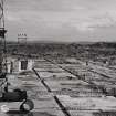 Image from photo album titled 'Longannet', Gen. Station No. 516, Main Building Area Foundations viewed from No. 1 Unit (looking East)