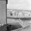 View from Gunsgreen House, Eyemouth, of N wall across harbour.