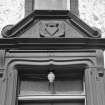 View of pediment above entrance doorway, south elevation, Ross Mains.