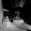 Image from untitled photo album, Boiler House: view from North-East corner of basement. Left-hand F.D. fan being erected.