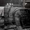 Image from untitled photo album, Turbine Room: View of Set Showing Control Oil Piping completed