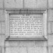 General view of plaque on East wall of West wing recording the building of the wings, 1830-33.
Insc: 'In 1816 Alexander Simpson Of Collyhill Bequeathed His Estates Of Barrack And Crichie To The   Govenors Of Robert Gordon's Hospital In Trust. The East & West Wings Were Built In 1833 At A Cost Of #13255 Of Which The Sum Of #4147 Was Paid By The Trust. By These Generous Gifts The Educational Benefits Of The Hospital Were Greatly Extended'.