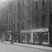 General view of ground floor shop fronts including Parker's Department store, Bristo Street, Edinburgh.