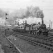 View from E showing Highland Railway Centenary Special Train passing Welsh's Bridge Signal Box and gantry