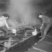 Bo@ness. Dock Foundry
Interior,View showing men pouring iron