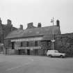 View of 45-51 North Street and wall of Scotland's Close, Bo'ness, from E.