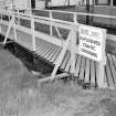 View of traffic sign warning of junction with typical wooden gangway (built on brick piers), adjacent to DL3 (Detonator Linear Loading)