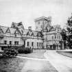 Digital copy of Moy Hall photographic print. General view of west entrance front from north west.