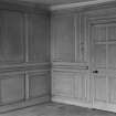 Interior view of Ambassador's House, 120 High Street, Linlithgow, showing door in paneled room.