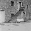 View of external stair, warehouse, Harbour Terrace, North Berwick, from N.