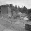 View of North elevation of the School, New Lanark, with the Dyeworks and Engineer's Shop behind.