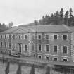 General view of The School, New Lanark, from North with Dyeworks behind.
