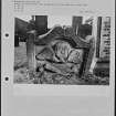 Photographs and research notes relating to graveyard monuments in Kirk O'Shotts Churchyard, Lanarkshire. 
