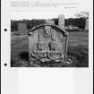Photographs and research notes relating to graveyard monuments in Oxnam Churchyard, Roxburghshire. 
