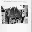 Photographs and research notes relating to graveyard monuments in Whitburn Churchyard, West Lothian. 
