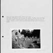Photographs and research notes relating to graveyard monuments in Glamis Churchyard, Angus. 
