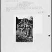 Photographs and research notes relating to graveyard monuments in Guthrie Churchyard, Angus. 
