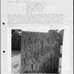 Photographs and research notes relating to graveyard monuments in Panbride Churchyard, Angus. 
