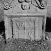 View of gravestone for Robert Wright (died 1717) in the churchyard of Dunbarney Parish Church.
Reverse of stone displaying winged soul and craft symbols.