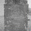 General view of East face of gravestone commemorating John Campbell, 1762, in the churchyard of Little Dunkeld Parish Church, showing winged soul and heart.