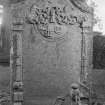 View of gravestone commemorating inscribed 'HM BB MU RT' in the churchyard of Inverarity Church.