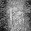 Detail of John Mcallaster's graveslab of 1764 showing sculpted wright's tools, in the churchyard of Buchlyvie Parish Church.