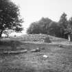 View of cairn and stone circle.