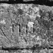 Detail of dated stone (1711) in S face of S wall of mill.