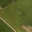 Oblique aerial view centred on the remains of the recumbent stone circle, taken from the SE.