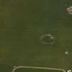 Oblique aerial view centred on the remains of the recumbent stone circle, taken from the WNW.