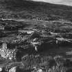 General view of ruined cottages.