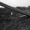 Excavation photograph : midden (9) on north side of wall (8).